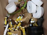 many rolls of toilet paper in a cardboard box