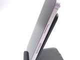 a cell phone that is sitting on top of a stand