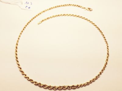 gold plated necklace with a chain that has a small bead on it