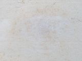 an image of a dirty wall with some stains on it