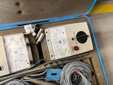a box of electrical equipment sitting on the floor