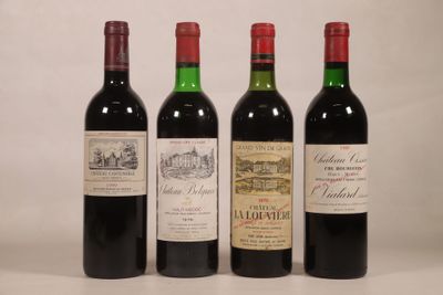 trois bouteilles de vin rouge sont alignées sur une table