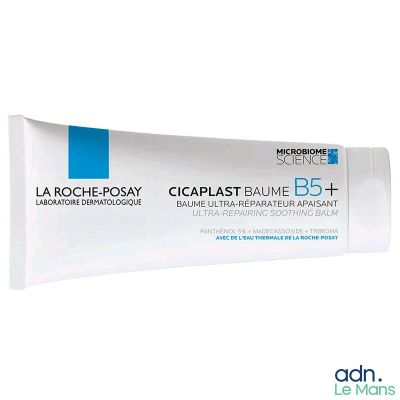 le tube de dentifrice est blanc et contient un tube de dentifrice bleu