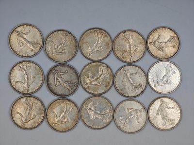 a close up of a bunch of coins sitting on top of a table