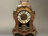 a clock that is sitting on top of a table