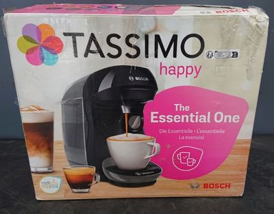 un coffret contenant une machine à café Tassimo Happy Espresso