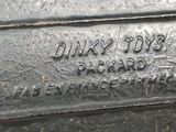 a close up of a metal object with writing on it