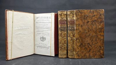an old book opened to show the inside of it