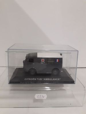 a small black truck in a clear box