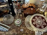 a table that has a cake on it and many other items on it