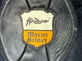 a badge on the back of a baseball glove