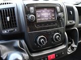 a dashboard of a car with a radio in it
