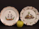 two plates with a picture of a man on a train and an apple