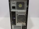 a close up of a computer tower with a keyboard and mouse