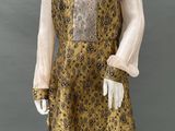an image of a mannequin dressed in a yellow dress
