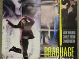 two movie posters on the wall of a room