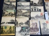 many old postcards that are on the table