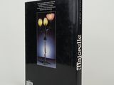 an image of a book with a picture of two flowers in a vase