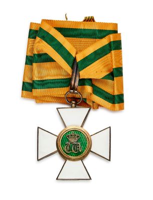 une image représentant une médaille ornée d'un ruban vert et jaune