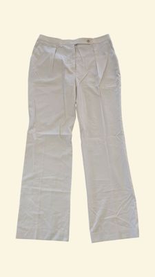 the pants are white and have buttons on the side