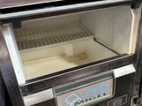 a machine that has a lot of food inside of it