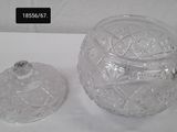 a clear glass jar with a lid on a table