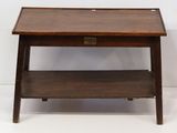 an image of a small wooden table with a drawer underneath it