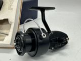 a picture of a fishing reel and a box of fishing gear