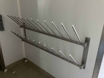 an image of a bathroom with a towel rack