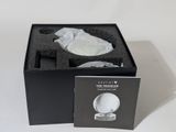 a black box with a white object inside of it
