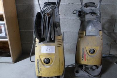 two vacuums sitting next to each other on the floor