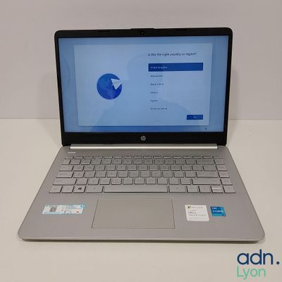 a laptop that is sitting on a white table