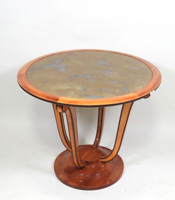an image of a table with a marble top and wooden legs
