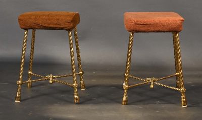 pair of antique brass stools with red upholstered cushions