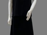an image of a mannequin dressed in a black dress