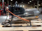 a machine that is sitting on a pallet in a warehouse