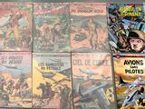 a lot of comic books that are on the table
