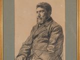 portrait of a man with a beard in a gold frame