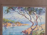 framed watercolor painting of a beach scene with trees and rocks