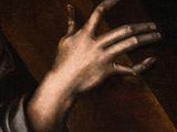 painting of a man holding a cross in his hand
