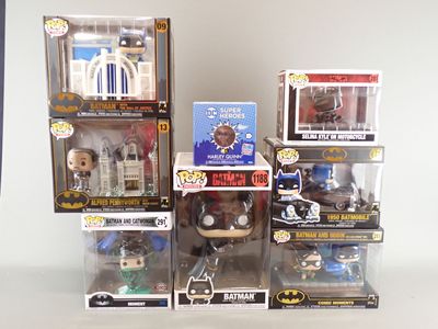 a lot of batman pop vinyl figures in the box