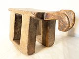 a wooden bench with a wooden handle on top of it