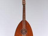 an old wooden instrument hanging from the ceiling