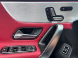 a close up of a car ' s interior with the door handle open