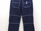 a close up of a pair of jeans on a hanger