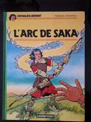 la couverture du livre *L'Arc de Saka*, avec une main qui tend vers elle