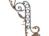 an image of a decorative iron letter j on a white background