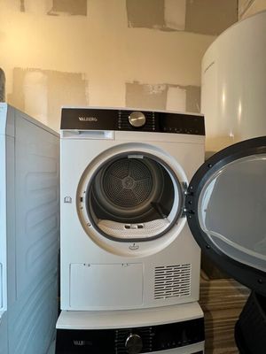 an image of a washer and dryer in a room