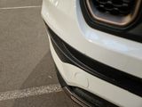 a close up view of a car ' s front bumper