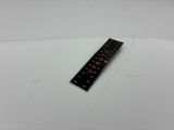 a ruler that is laying on top of a table